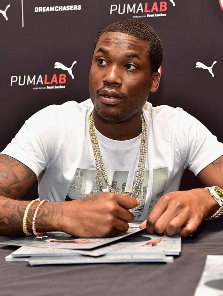 Meek Mill signing photos